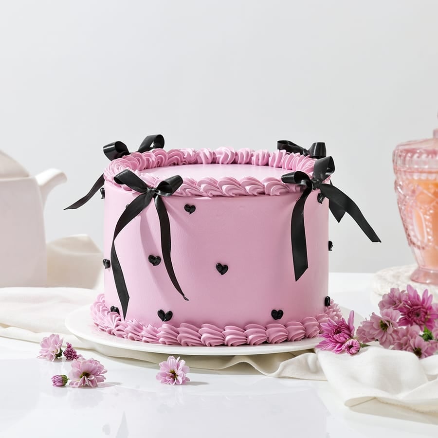 Layers And Bow Cream Cake