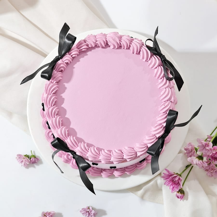 Layers And Bow Cream Cake